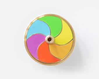 Spinning (desk)top - Brass spinning top, inspired by apple's mac rainbow pinwheel / disk of doom / beachball / buffering cursor