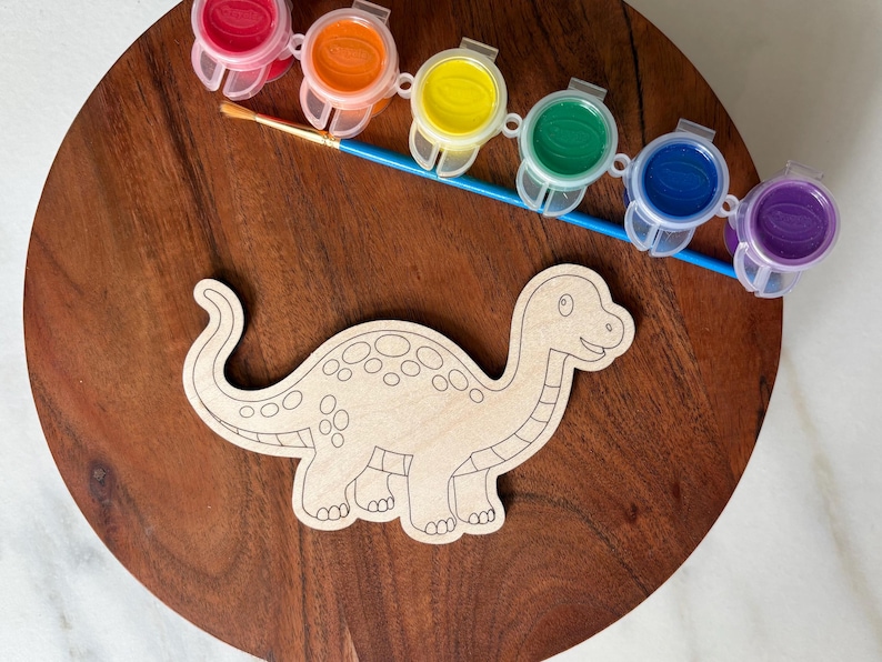 May include: A handmade wooden sign with the text "Welcome to our home" in a handwritten style. The sign is painted white with a dark stained frame. Dimensions are approximately 12 inches wide and 8 inches tall.