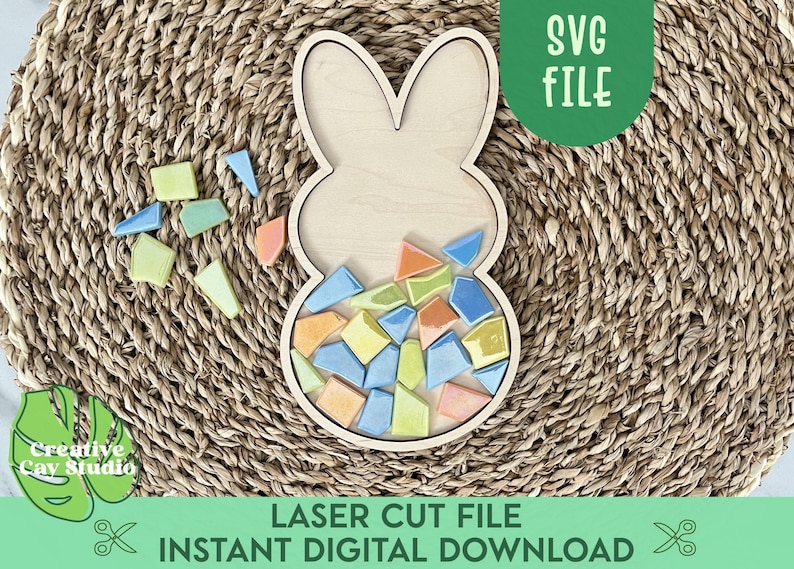 May include: A wooden bunny shaped puzzle with a cutout for a mosaic of colorful tiles. The puzzle is on a woven straw mat. The text "SVG FILE" is in a green box at the top of the image. The text "LASER CUT FILE INSTANT DIGITAL DOWNLOAD" is at the bottom of the image.