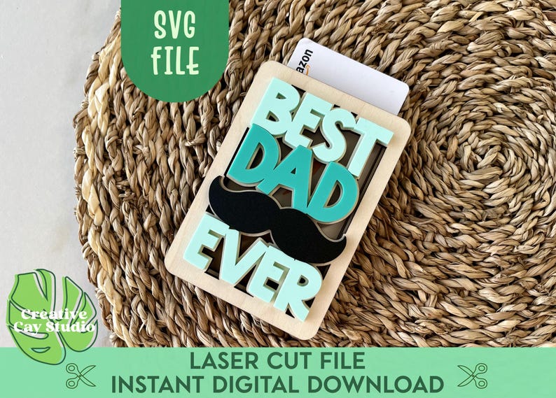 May include: A wooden sign with the words "Best Dad Ever" in green and black letters. The sign is on a woven straw background.