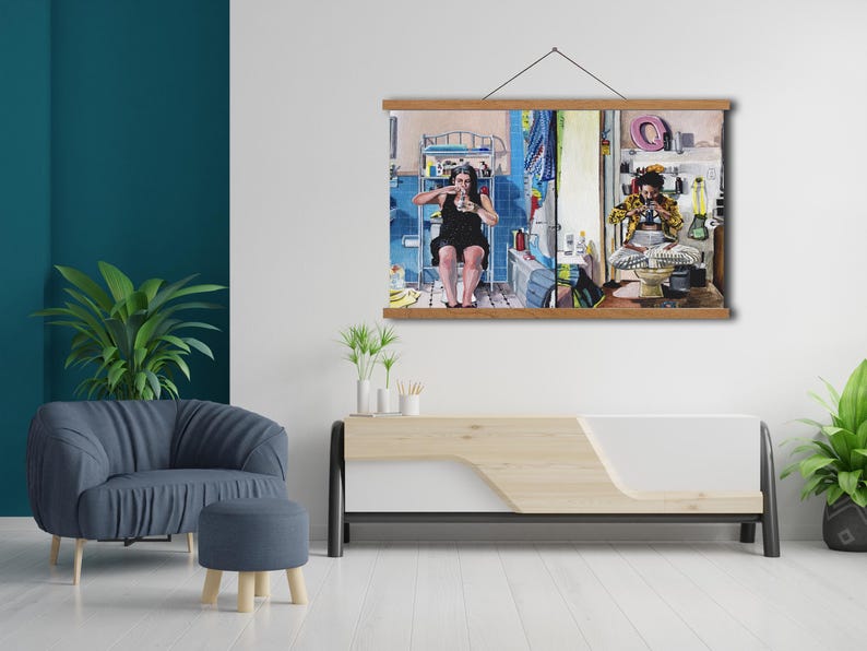 May include: A framed painting depicting two women in a bathroom setting. One woman is sitting on a toilet, while the other is sitting on a bathtub. The painting is in a modern style with bright colors and bold lines.