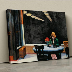 May include: A painting of a woman in a green dress and a yellow hat sitting at a table in a cafe. The cafe has a dark interior with a large window and a radiator. There are flowers on the table and the woman is holding a cup.