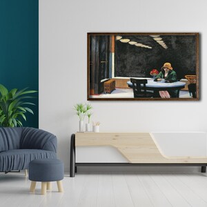 May include: A framed painting of a woman sitting at a table in a restaurant. The woman is wearing a green jacket and a hat. The painting is set against a dark background with a few lights.
