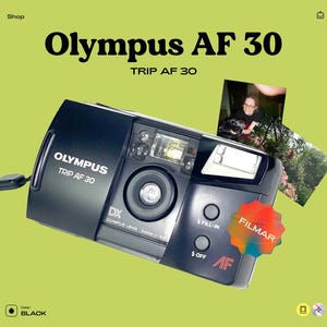 Olympus trip af 30 — 35mm point-and-shoot film camera, 34mm f/5.6 af lens, built-in flash, tested