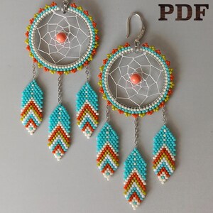 May include: A pair of handmade dreamcatcher earrings. Each earring features a beaded circular frame with a web design and dangling beaded feather charms. The earrings are turquoise, orange, yellow, white, and coral.