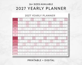 May include: A 2027 yearly planner featuring a grid layout with months listed in a pink gradient column on the left. The calendar displays days of the month in rows with alternating pink shaded columns. Text includes 26+ SIZES AVAILABLE, 2027 YEARLY PLANNER, and PRINTABLE + DIGITAL.