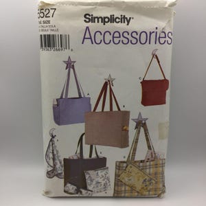 May include: Simplicity pattern #5527 for accessories. The pattern includes instructions for making six different bags, including a tote bag, a shoulder bag, and a small pouch. The bags are shown in various colors and fabrics.
