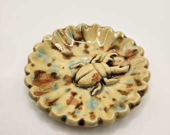 Tiny Ceramic Ring Dish. Flower with beetle. 2in. Tan with brown and blue speckles.