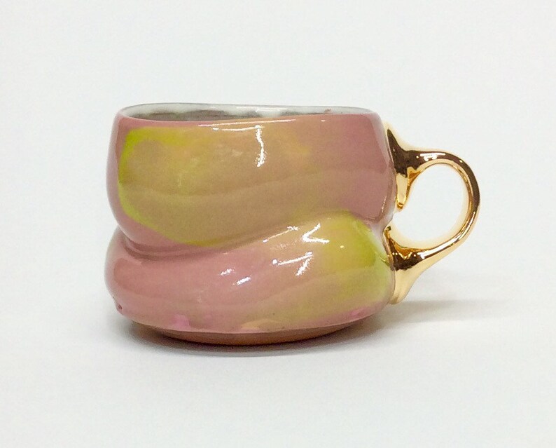 Pink and chartreuse mug with gold handle