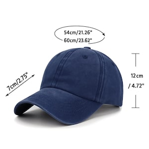May include: A navy blue baseball cap with a curved brim. The cap measures 7cm/2.75" in height, 54cm/21.26" to 60cm/23.62" in circumference, and 12 cm/4.72" in depth. The hat is made of a soft, durable material.