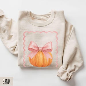 Pumpkin Coquette Bow Sweatshirt, Pink Coquette Bow Halloween Sweater, Cute Fall Pumpkin Shirt, Girly Autumn Sweatshirt, Pumpkin Sweatshirt