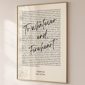 May include: A framed print with the text "To whatever end, Fireheart" in a stylized font. The print has a beige background with black text and a gold frame. The bottom of the print reads "Chapter 60, Heir of Fire."