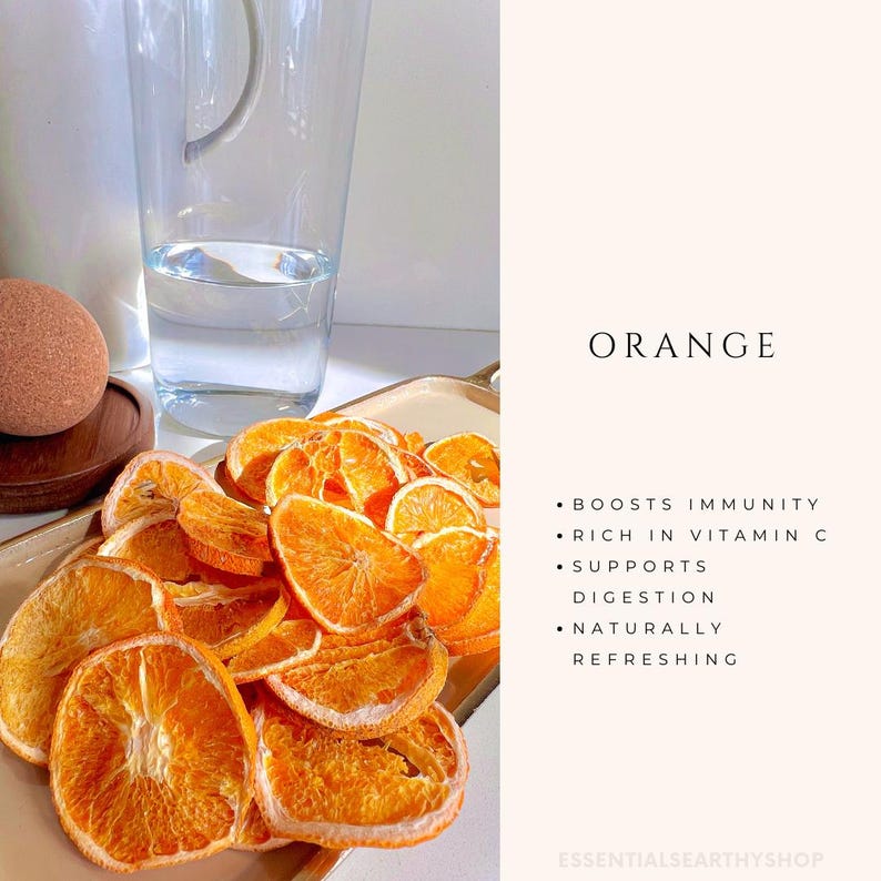 May include: Dried orange slices on a gold tray. The orange slices are a vibrant orange colour and are arranged in a random pattern. The text "ORANGE" is in black text on a light beige background. The text below "ORANGE" reads: "BOOSTS IMMUNITY", "RICH IN VITAMIN C", "SUPPORTS DIGESTION", "NATURALLY REFRESHING". The text "ESSENTIALS EARTHY SHOP" is at the bottom of the image.
