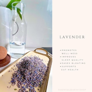 May include: Dried lavender flowers on a gold tray. Lavender is known to promote well-being, improve sleep quality, ease bloating, and support gut health.