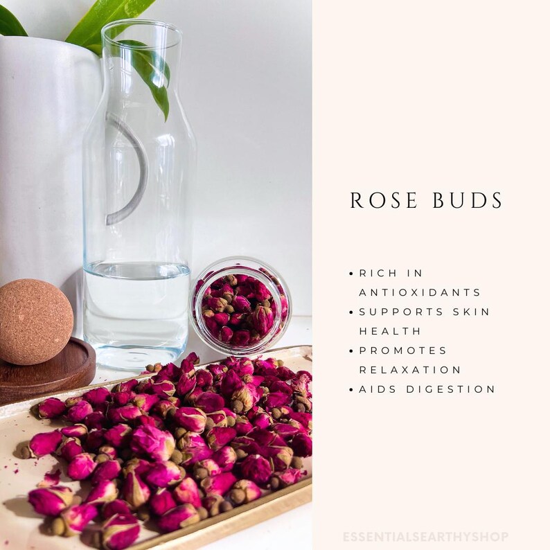 May include: Dried rose buds in a glass jar and on a gold tray. The text "ROSE BUDS" is written in black on a pink background. The text below reads: "RICH IN ANTIOXIDANTS, SUPPORTS SKIN HEALTH, PROMOTES RELAXATION, AIDS DIGESTION".