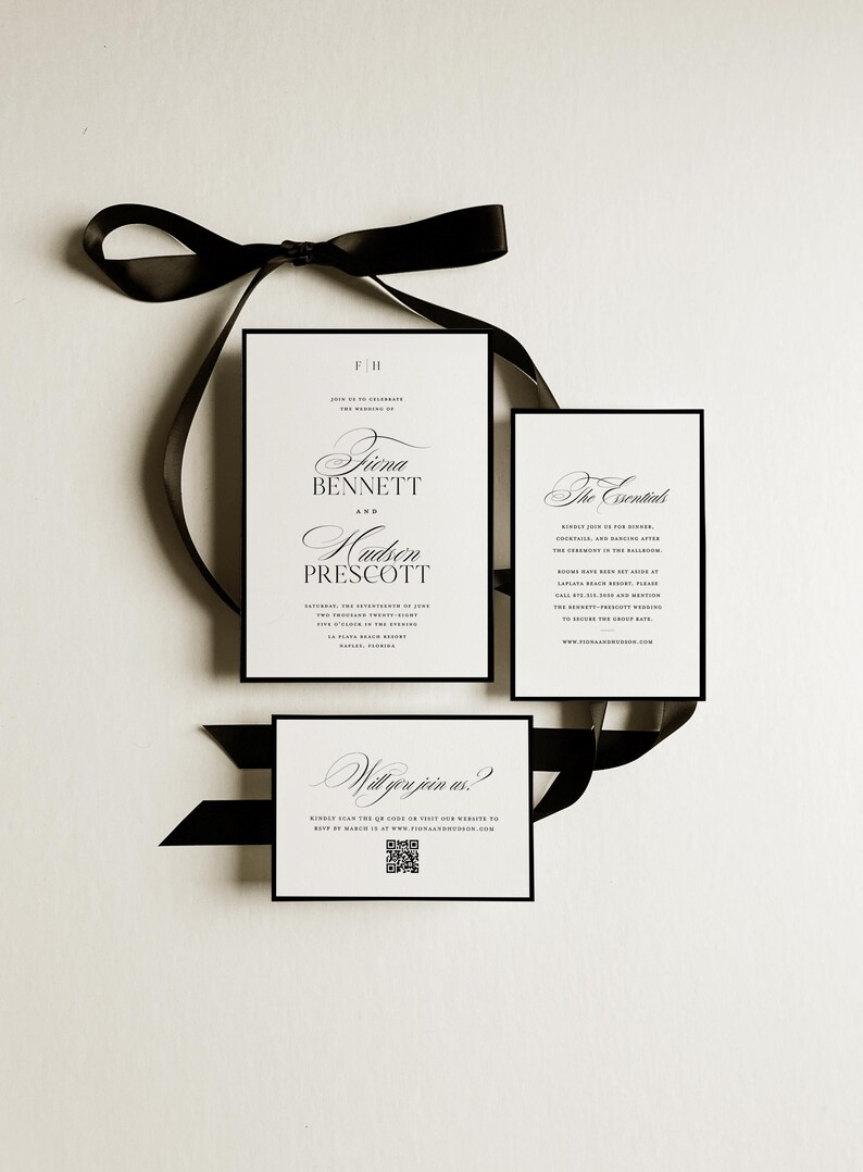 May include: A stylish wedding invitation suite comprising three cards with black borders and text. The main card displays the names "Fiona Bennett" and "Hudson Prescott." A black satin ribbon is arranged around the cards.