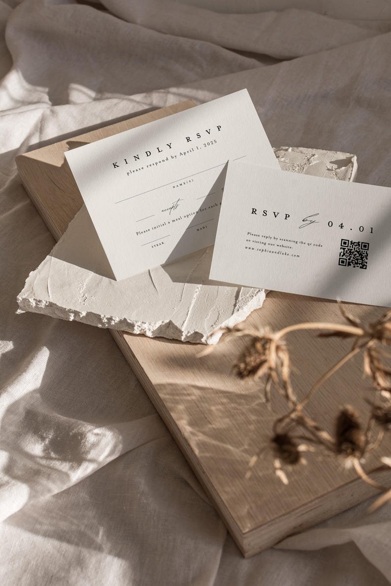 May include: A white RSVP card with black text. The text reads "Kindly RSVP, please respond by April 1, 2025". There is a smaller white card with black text that reads "RSVP by 04.01".