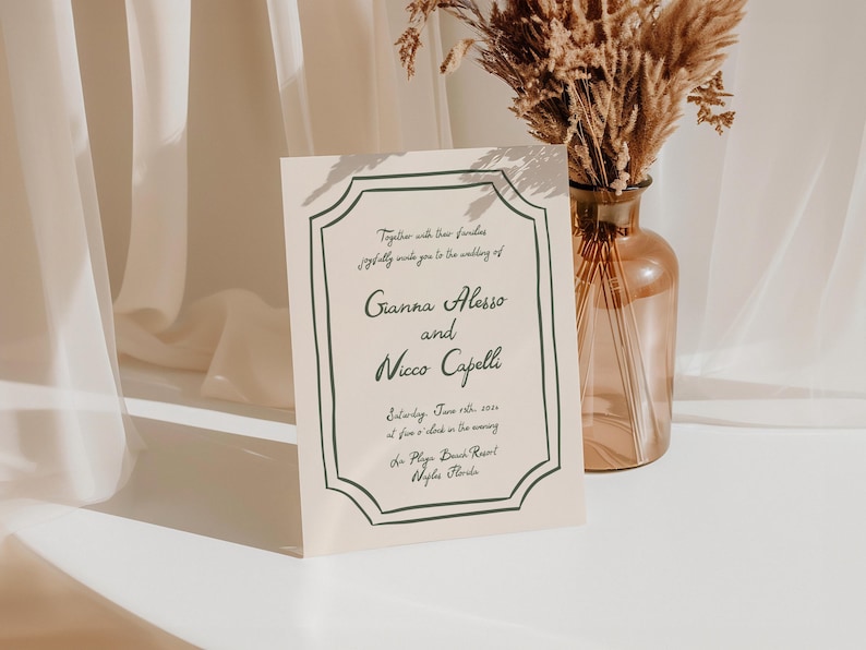 May include: A cream-colored wedding invitation with black and green lettering. The invitation reads "Together with their families joyfully invite you to the wedding of Gianna Alesso and Nicco Capelli Saturday, June 12th, 2023 at five o'clock in the evening The Playa Beach Resort Naples, Florida"