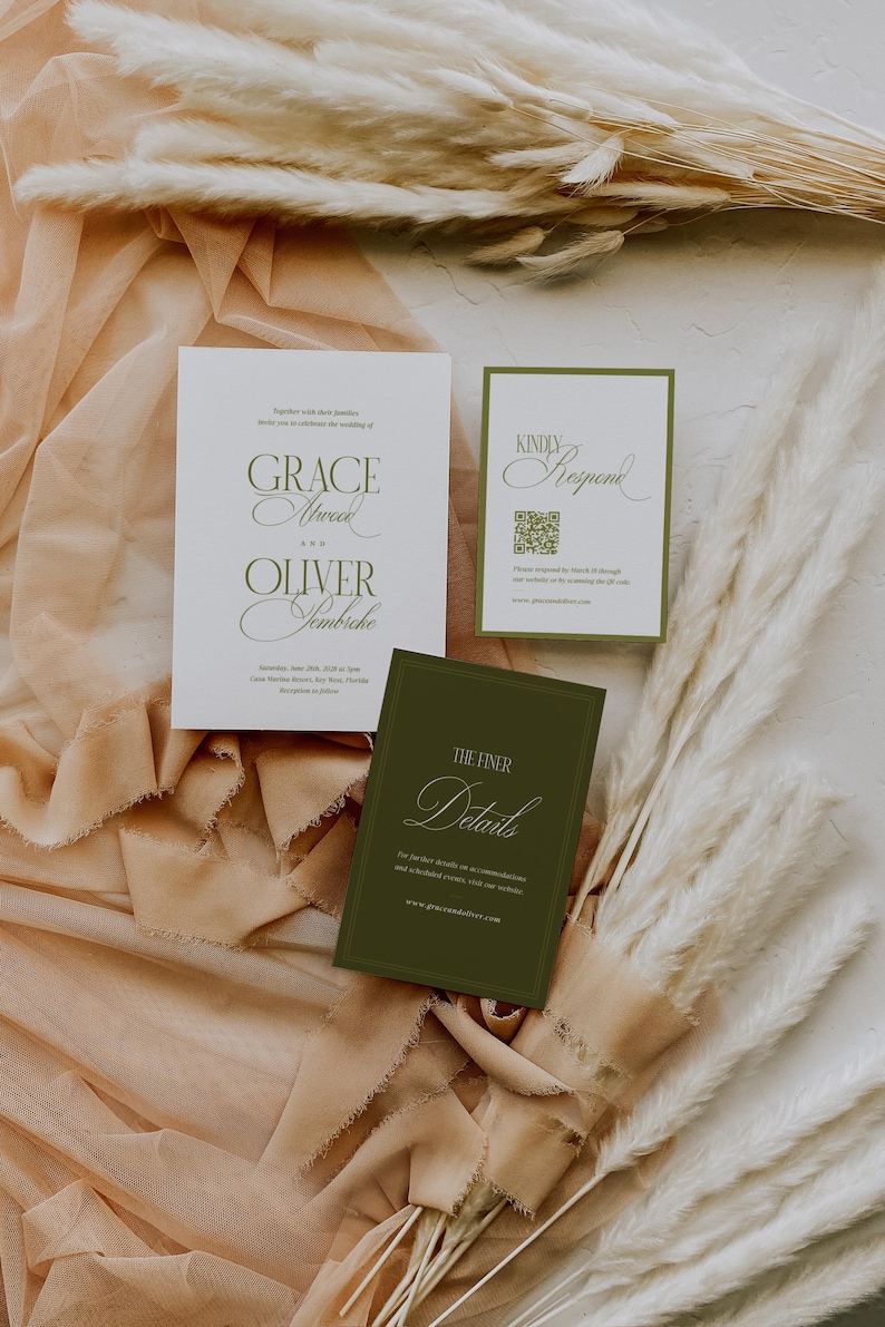 May include: Wedding invitation suite featuring a main invitation, RSVP card, and details card. The invitation is white with olive green text, including the names "Grace Atwood" and "Oliver Sembriche." The details card is olive green with white text. The suite is arranged on a beige fabric.