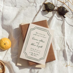 May include: A wedding invitation with a white background and green text. The invitation reads "Together with their families joyfully invite you to the wedding of Gianna Alesso and Nicco Capelli Saturday, June 18th, 2023 at five o'clock in the evening La Playa Beach Resort Naples, Florida"
