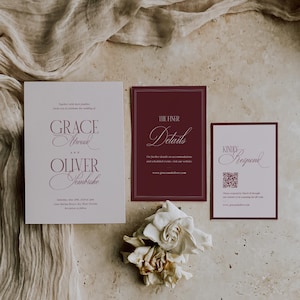 Puede incluir: Conjunto de invitaciones de boda con tres tarjetas en tonos burdeos y crema. La invitaci&oacute;n principal enumera los nombres Grace Atwood y Oliver Jembroke. La tarjeta de detalles dice "The Finer Details". Tambi&eacute;n se incluye una tarjeta "Kindly Respond".