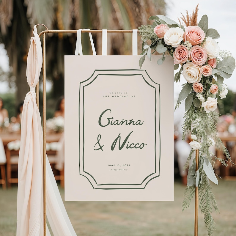 May include: A wedding welcome sign with a white background and black border. The sign reads "Welcome to the wedding of Gianna & Nicco June 13, 2023 #foreverlove".