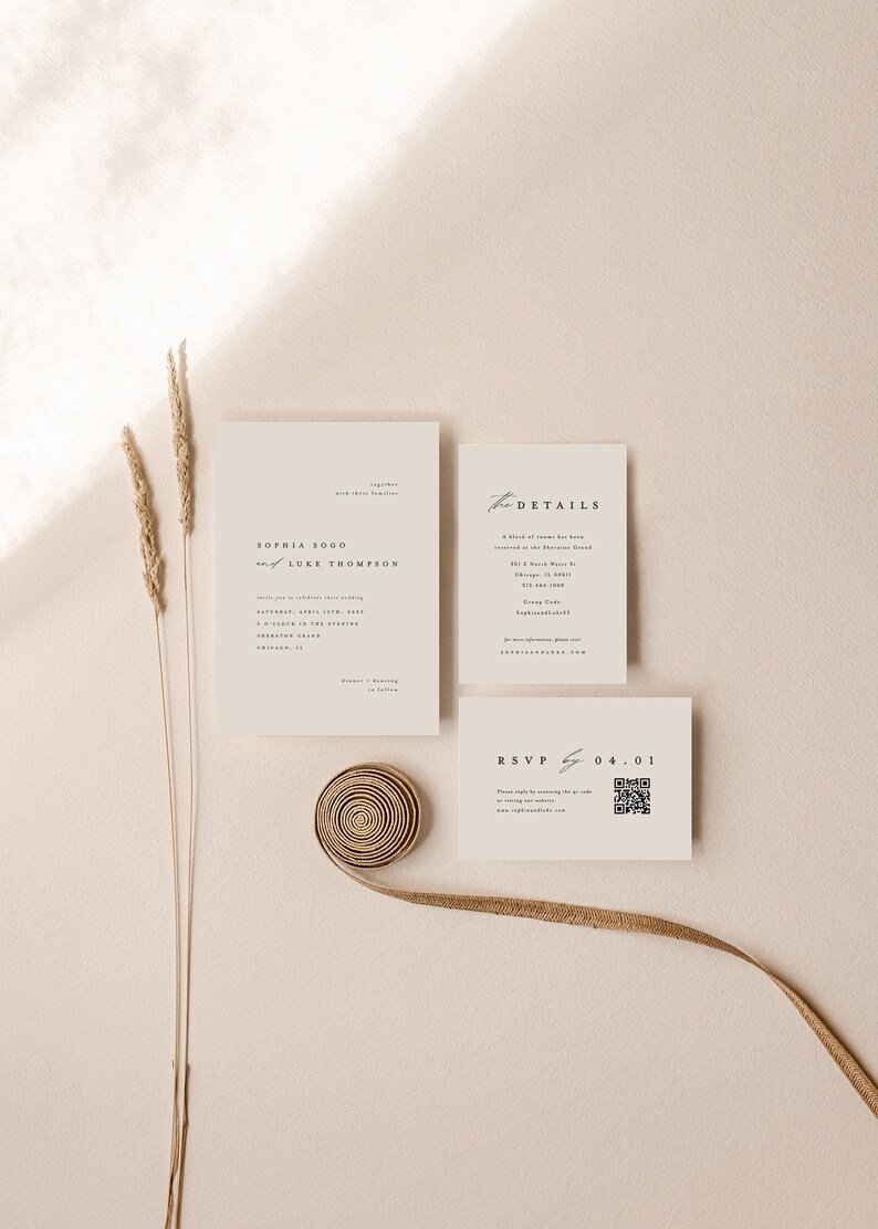 May include: A minimalist wedding invitation suite with a cream background. The invitation card features the names "Sophia Bogo and Luke Thompson" in a simple font. The details card includes the date, time, and location of the wedding. The RSVP card has a QR code for guests to respond.