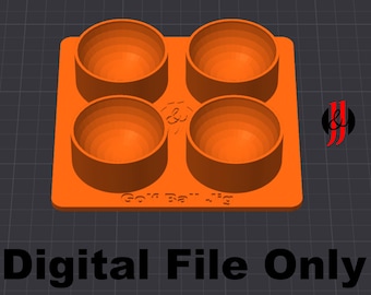 May include: Orange 3D-printed golf ball jig with four circular indentations. The text "Golf Ball Jig" is printed on the base. The words "Digital File Only" are printed at the bottom.