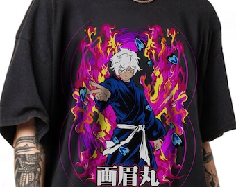 May include: Black t-shirt with an anime-style illustration. The graphic shows a character in a blue robe with white hair, surrounded by purple and yellow flames and blue butterflies. Japanese text is at the bottom.