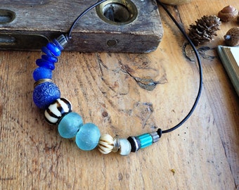 A long unisex ethnic necklace, with recycled Ghana glass beads; batik bone and horn Mali bead ...: "Energy Vibrations"