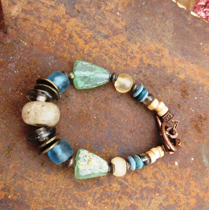 with these antique neolithic quartz beads .... The Glazes Of The Waves precious and unisex tribal bracelet