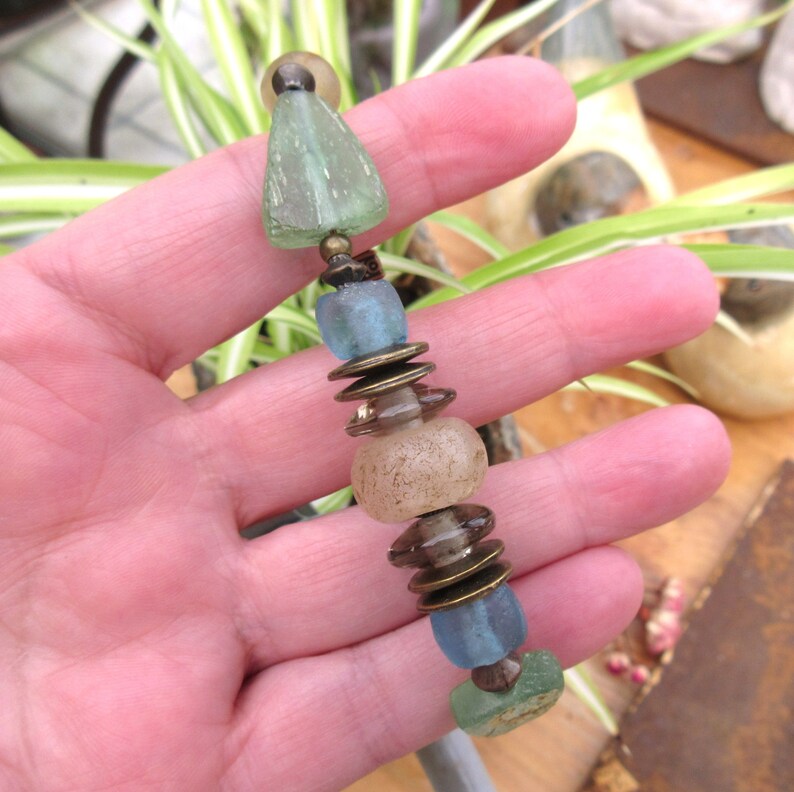 with these antique neolithic quartz beads .... The Glazes Of The Waves precious and unisex tribal bracelet