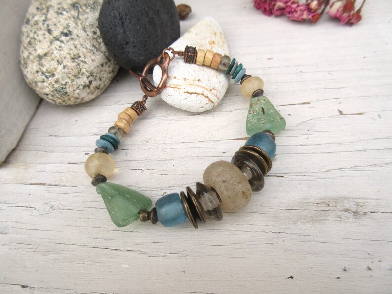 with these antique neolithic quartz beads .... The Glazes Of The Waves precious and unisex tribal bracelet