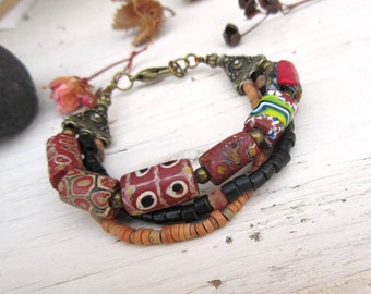 A bracelet 3 rows, tribal style, nomad and boho chic, ancient millefiori beads ... : "Echoes Of Stones"