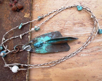 A braided hemp necklace with industrial pod pendant: Touch The Time !!!!!!