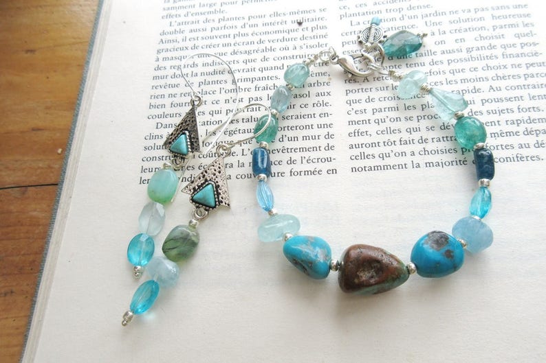 Songs Of The Sea for this romantic ornaments earrings and bracelet with precious stones ....