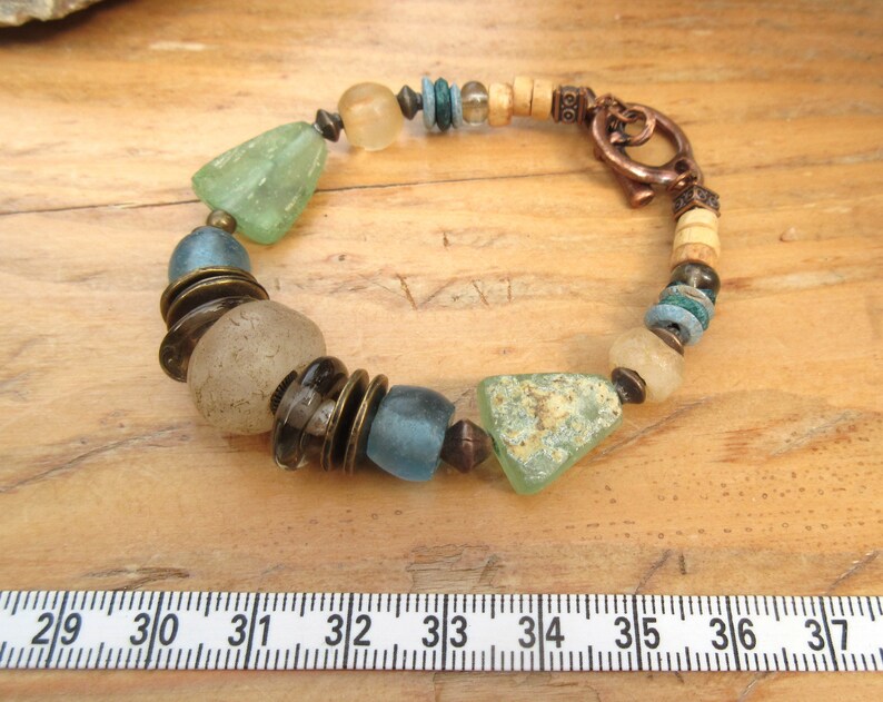 with these antique neolithic quartz beads .... The Glazes Of The Waves precious and unisex tribal bracelet