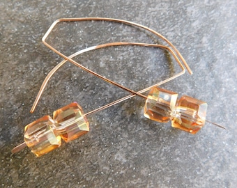 Champagne crystals on rose gold wire earrings.