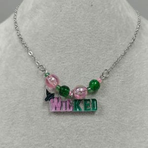 Wicked Necklace Wicked Word Pendant Necklace Stainless-Steel Glinda Necklace Elphaba Necklace Wicked Pink Green Wicked Charm Wicked Pendant
