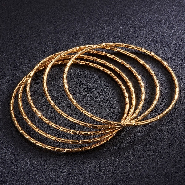 High quality 24 k gold  plated  brass  textured bangle bracelets set of 5 Bangle is 2mm thick  7 1/2 inch around