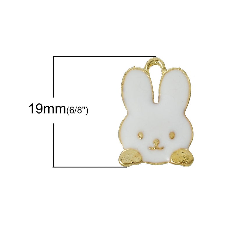May include: Gold-tone charm featuring a white enamel bunny with a cute face. The charm is approximately 19mm (6/8 inches) in size.