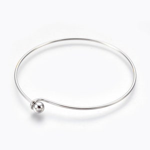 Silver or gold  plated 1.5 mm locking bangle bracelet with removable end cap bead to make your own jewelry