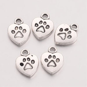 Paw print in a heart shaped antique silver charm . Set of 5 Silver alloy, pet charm, DIY jewelry, non tarnish charm