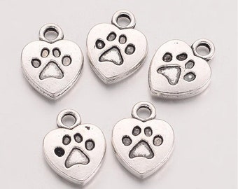 Paw print in a heart shaped antique silver charm . Set of 5 Silver alloy, pet charm, DIY jewelry, non tarnish charm