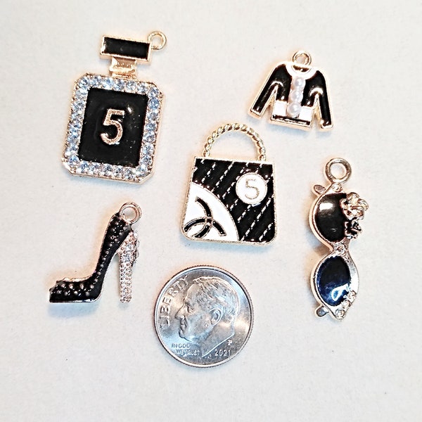 Black and white enamel and gold fashion charm group of 5 charms: Black & white purse, rhinestone high heel,perfume , sweater and sunglasses