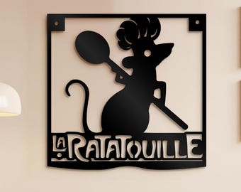 May include: Black metal wall art featuring a silhouette of Remy the rat from the movie Ratatouille, holding a large spoon. The text "La Ratatouille" is below the image.