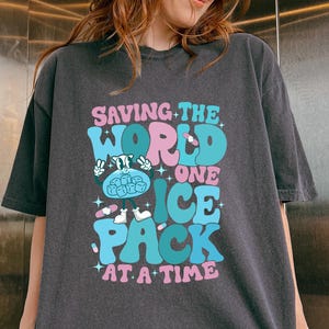 Saving The World One Ice Pack At A Time Shirt, Personalized School Nurse Sweatshirt, School Nurse T Shirt, School Nurse Comfort Shirt