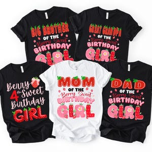 May include: A collection of five short-sleeved t-shirts in black and white, featuring strawberry-themed graphics and text including Big Brother, Great Grandpa, Berry 4th Sweet Birthday Girl, Mom, and Dad of the Berry Sweet Birthday Girl.