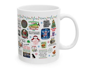 May include: A white ceramic mug featuring a collage of Christmas-themed graphics and quotes from the movie National Lampoon's Christmas Vacation, including images of a station wagon, a decorated tree, and text like Hallelujah Holy Shit.