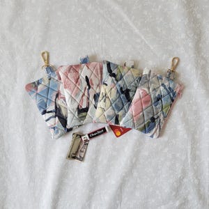 Mini bolsa clutch acolchoada: porta-moedas com acolchoamento floral, porta-chaves